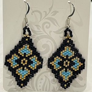 Handmade Black and teal 24kt gold earrings.